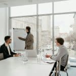 CTO leading a strategic technology discussion with engineering team in a modern office.